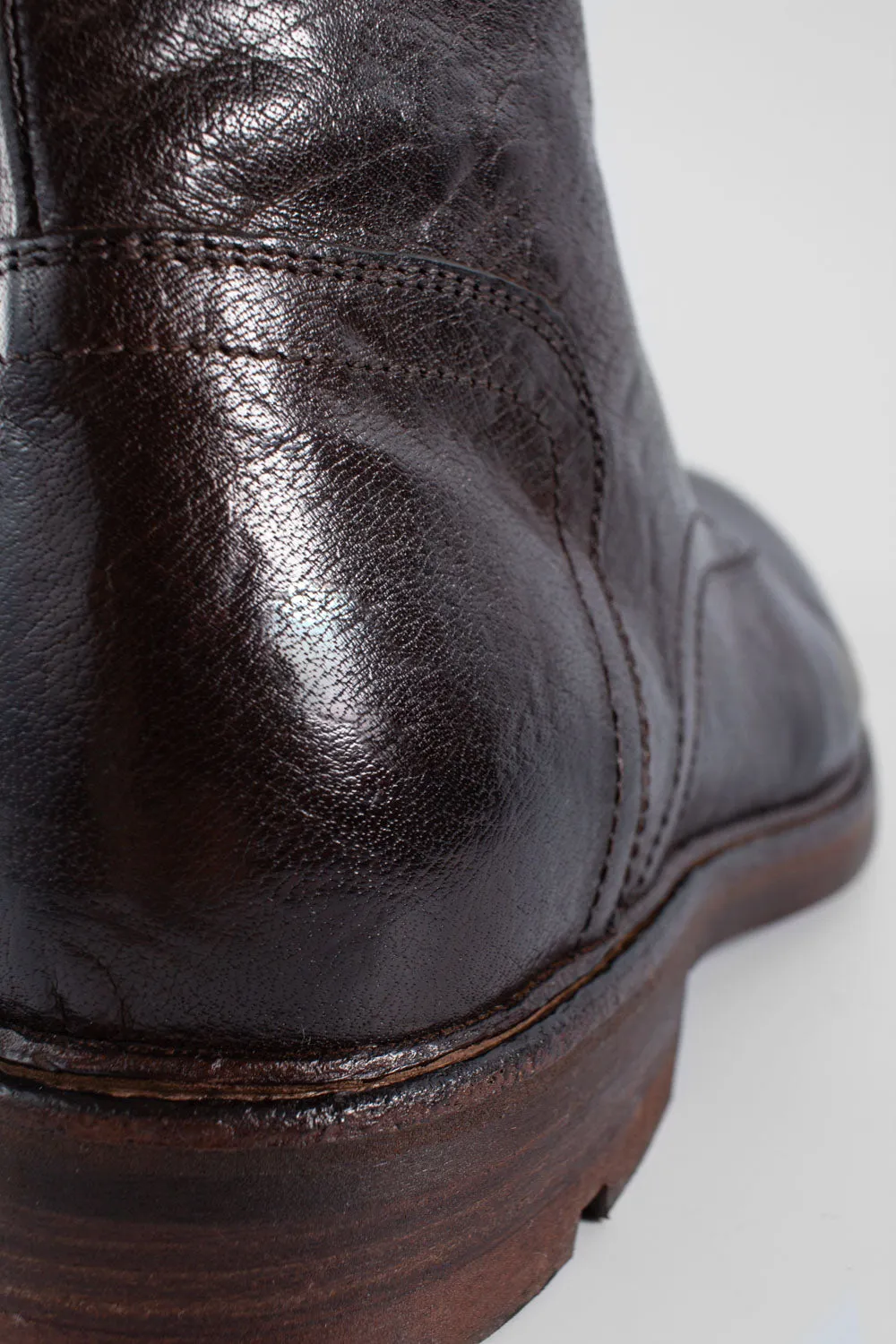 LENNOX cigar-brown military boots.